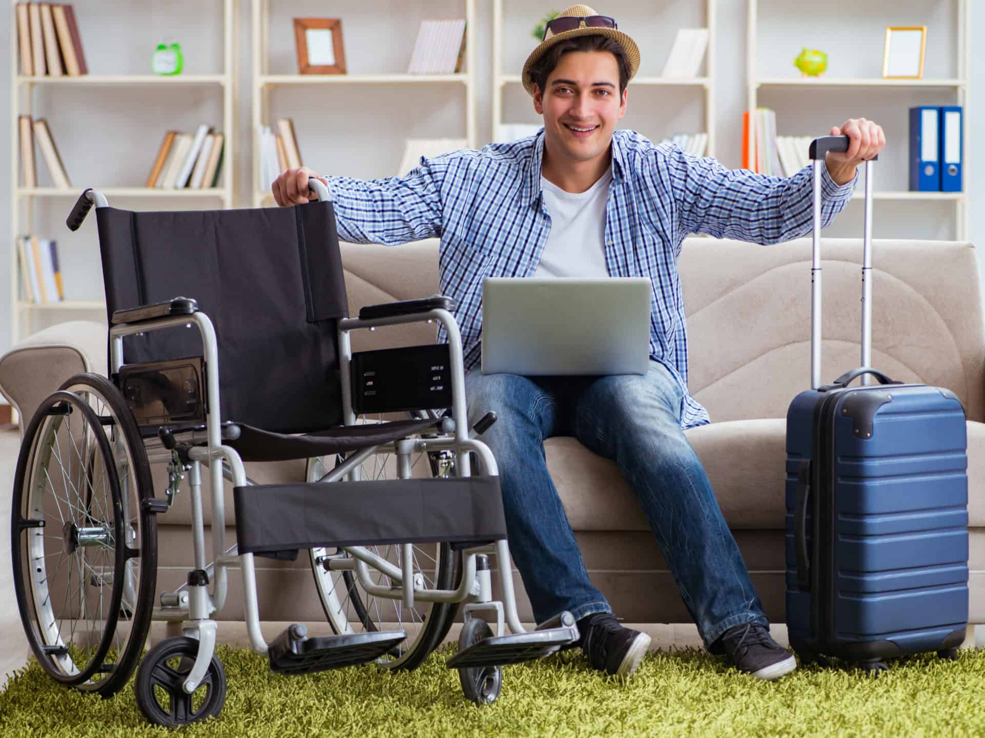 Disabled,Man,Booking,Travel,Online,Using,Laptop,Computer