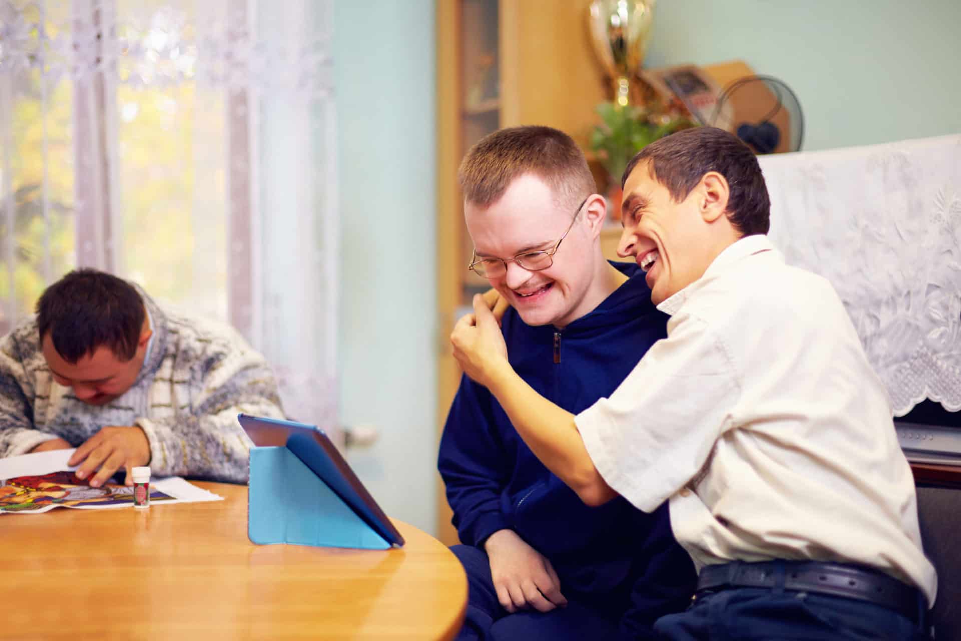 Happy,Friends,With,Disability,Socializing,Through,Internet